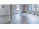 Spacious living room with new floors and plenty of natural light at 4814 Fayetteville Rd, Durham, NC 27713