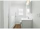 Bright bathroom with a walk-in tub, vanity, and modern fixtures at 492 Pixley Pritchard Rd, Timberlake, NC 27583