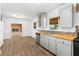 Updated kitchen featuring stylish gray cabinets, butcher block countertops, and stainless steel appliances at 492 Pixley Pritchard Rd, Timberlake, NC 27583