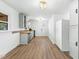 Well-lit kitchen with gray cabinets, butcher block counters, and stainless appliances at 492 Pixley Pritchard Rd, Timberlake, NC 27583