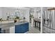 Kitchen with stainless steel appliances, counter seating and ample room for entertaining at 507 Town Crier Ct, Hillsborough, NC 27278