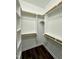 Walk-in closet with custom shelving and ample storage space, ready for organization at 512 Hicksmill Rd, Oxford, NC 27565
