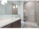 Updated bathroom features a glass shower and sleek vanity at 515 N Mangum St # 14, Durham, NC 27701