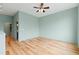Spacious bedroom boasts hardwood floors and a modern ceiling fan at 515 N Mangum St # 14, Durham, NC 27701