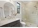 Stylish bathroom with a glass-enclosed shower, modern fixtures, and a sleek vanity at 5213 Bent Leaf Dr, Raleigh, NC 27606