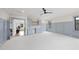 Large bedroom with built in desk area, white marble backsplash, with light blue cabinets and trim at 5213 Bent Leaf Dr, Raleigh, NC 27606