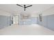 Large bedroom with built in desk area, white marble backsplash, with light blue cabinets and trim at 5213 Bent Leaf Dr, Raleigh, NC 27606