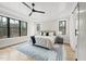 Bright main bedroom featuring natural light, neutral color palette and tray ceiling at 5213 Bent Leaf Dr, Raleigh, NC 27606