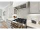 Up close view of the kitchen gas cooktop at 5213 Bent Leaf Dr, Raleigh, NC 27606