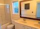 Bathroom features a double sink vanity and separate glass shower at 5321 Cog Hill Ct, Raleigh, NC 27604