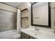 The bathroom features a tub, mirror, and modern sink at 5321 Cog Hill Ct, Raleigh, NC 27604