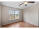 Bedroom with a window allowing natural light and a ceiling fan at 5321 Cog Hill Ct, Raleigh, NC 27604