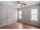 This spacious bedroom offers natural light, wood floors, and a closet at 5321 Cog Hill Ct, Raleigh, NC 27604