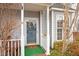 Welcoming front door with decorative wreath and a well-maintained entrance at 5321 Cog Hill Ct, Raleigh, NC 27604