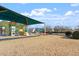 Community playground featuring modern equipment, a covered play area, and ample space for recreational activities at 5321 Cog Hill Ct, Raleigh, NC 27604