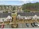 Aerial view of townhomes with parking, landscaping, and surrounding residential area at 533 Berry Chase Way, Cary, NC 27519