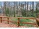 Enjoy the privacy of the wooded view from the outdoor deck at 5738 Sentinel Dr, Raleigh, NC 27609