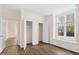 Neutral bedroom with closet space and natural light and hardwood floors for comfort and style at 5738 Sentinel Dr, Raleigh, NC 27609