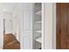 Bright hallway features white molding and storage at 5738 Sentinel Dr, Raleigh, NC 27609