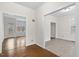 Open living room featuring wood floors, and views to the outdoors at 5738 Sentinel Dr, Raleigh, NC 27609