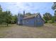 Back exterior view featuring the home's design and yard space at 613 Mclean St, Spring Hope, NC 27882