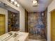 Bathroom with beautiful tile shower and granite vanity at 613 Mclean St, Spring Hope, NC 27882