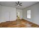 Spacious bedroom features hardwood floors, closet, and ample natural light at 613 Mclean St, Spring Hope, NC 27882