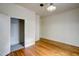 Bedroom with hardwood floors, closet, and ample natural light at 613 Mclean St, Spring Hope, NC 27882