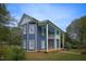 Charming two-story home with a welcoming front porch, offering curb appeal at 613 Mclean St, Spring Hope, NC 27882