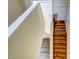 Unique stairway featuring beautiful wooden steps and neutral paint colors throughout at 613 Mclean St, Spring Hope, NC 27882
