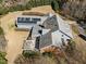 Overhead view of a home with solar panels, pergola, and well-maintained lawn, showcasing the property's features at 6336 Wrenwood Ave, Raleigh, NC 27607