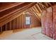 Unfinished attic space with exposed beams and wood at 6336 Wrenwood Ave, Raleigh, NC 27607