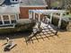 Aerial view of a private backyard featuring a custom patio area with a built-in grill at 6336 Wrenwood Ave, Raleigh, NC 27607