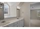 Bathroom featuring double sink vanity with white countertop at 6336 Wrenwood Ave, Raleigh, NC 27607