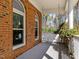 Relax on the brick front porch swing while enjoying the view in this charming brick home at 6336 Wrenwood Ave, Raleigh, NC 27607