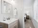 Bathroom with modern sink and view of the bedroom at 6713 Brookhollow Dr, Raleigh, NC 27615