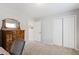 Bedroom with closet and light-colored carpet at 6713 Brookhollow Dr, Raleigh, NC 27615
