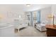 Bright Bedroom with a crib, changing table, comfy chair, and natural light at 6713 Brookhollow Dr, Raleigh, NC 27615