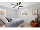 Bedroom with a ceiling fan, chair and bright light at 6713 Brookhollow Dr, Raleigh, NC 27615