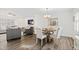 Elegant dining area adjacent to living room with stylish accents at 6713 Brookhollow Dr, Raleigh, NC 27615