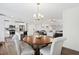 Open floor plan connecting dining room, kitchen, and living area at 6713 Brookhollow Dr, Raleigh, NC 27615