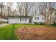 Charming home with a well-maintained lawn and attached garage at 6713 Brookhollow Dr, Raleigh, NC 27615