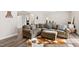 Comfortable living room features stylish sectional and décor at 6713 Brookhollow Dr, Raleigh, NC 27615