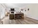Open living room features a fireplace and seamless access to additional features at 6713 Brookhollow Dr, Raleigh, NC 27615