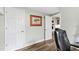 Office with LVP flooring and multiple white doors at 6713 Brookhollow Dr, Raleigh, NC 27615