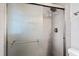 Tile shower featuring a frosted shower door at 6713 Brookhollow Dr, Raleigh, NC 27615