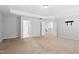 Basement featuring carpet, neutral walls, and multiple entrances at 701 Prince Dr, Holly Springs, NC 27540