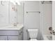 Cozy bathroom featuring a vanity with sink, toilet, and shower/tub combination at 701 Prince Dr, Holly Springs, NC 27540
