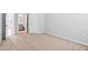 Spacious carpeted bedroom with neutral walls at 701 Prince Dr, Holly Springs, NC 27540