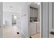 Hallway leading to the laundry room and bathroom at 701 Prince Dr, Holly Springs, NC 27540